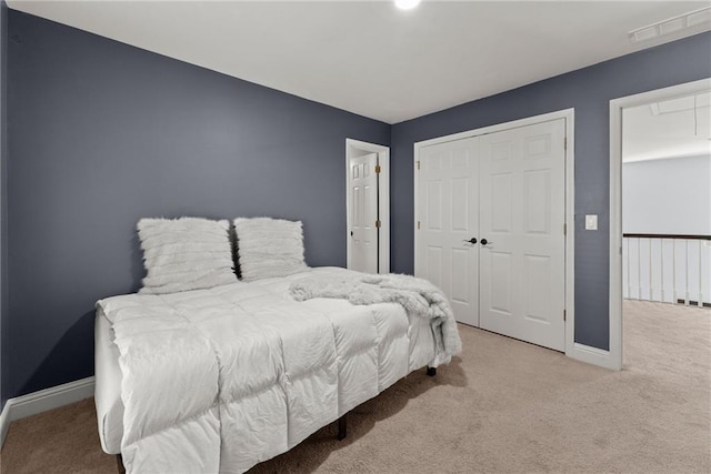 bedroom with light colored carpet