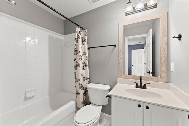 full bathroom with vanity, toilet, and shower / tub combo with curtain