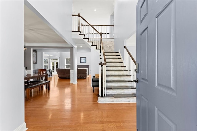 foyer featuring french doors and light hardwood / wood-style flooring