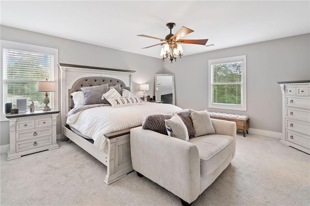 2545 Hickory Level Rd, Villa Rica, GA 30180 - bedroom with light carpet, baseboards, and a ceiling fan