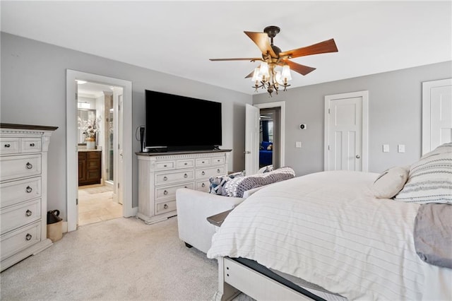 2545 Hickory Level Rd, Villa Rica, GA 30180 - bedroom with light carpet, ensuite bathroom, and a ceiling fan