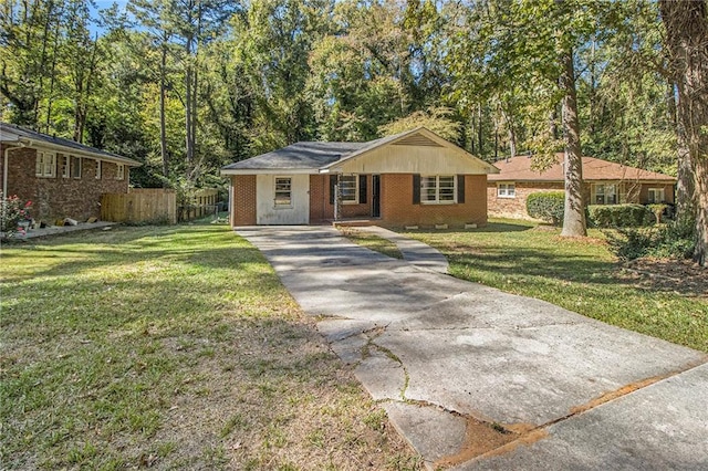 single story home featuring a front yard