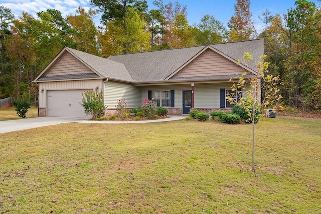 craftsman house with a garage and a front yard