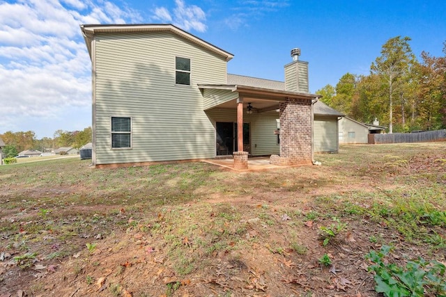 back of property featuring a patio