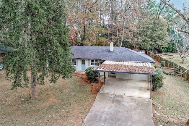 view of front of home featuring a carport