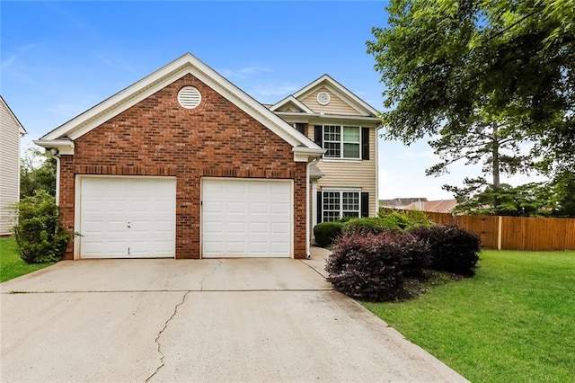traditional-style house with concrete driveway, brick siding, and an attached garage