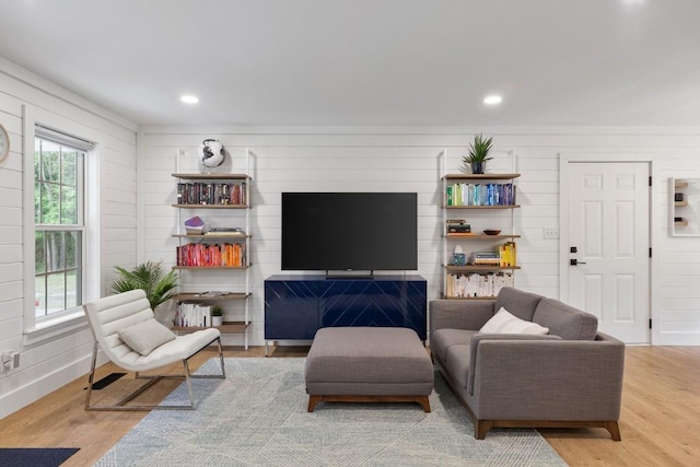 living room featuring wood finished floors and recessed lighting