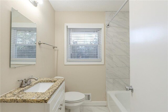 full bathroom featuring shower / bath combination, toilet, and vanity