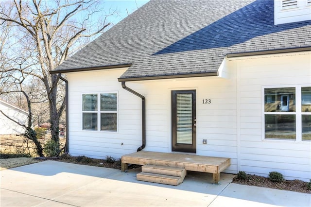 doorway to property featuring a patio