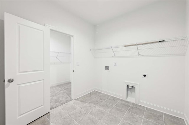 laundry room with electric dryer hookup, laundry area, baseboards, and hookup for a washing machine