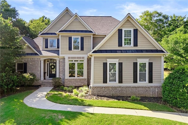 4440 Green Summers Dr, Cumming, GA 30028 - view of front of property featuring a standing seam roof, brick siding, a front yard, and metal roof