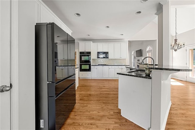 4440 Green Summers Dr, Cumming, GA 30028 - kitchen featuring black appliances, a sink, tasteful backsplash, white cabinetry, and recessed lighting