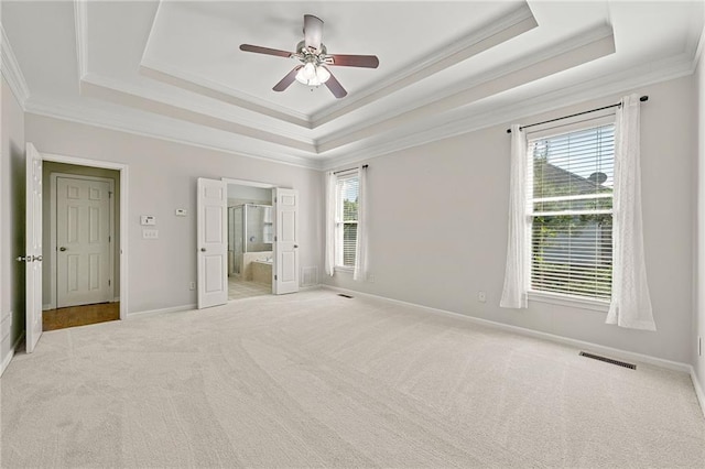4440 Green Summers Dr, Cumming, GA 30028 - unfurnished bedroom featuring crown molding, a raised ceiling, carpet floors, ensuite bath, and baseboards