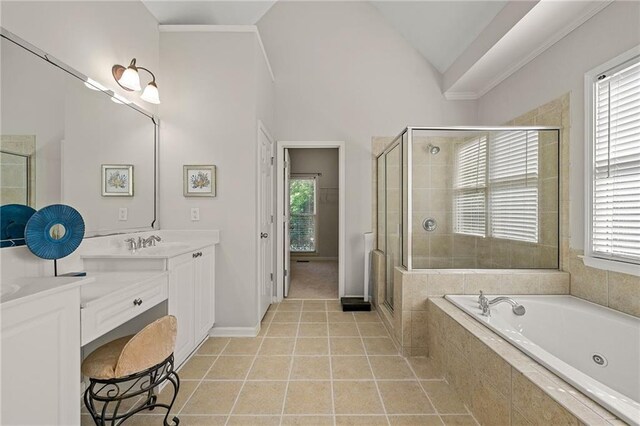 4440 Green Summers Dr, Cumming, GA 30028 - full bathroom with double vanity, a tub with jets, a shower stall, vaulted ceiling, and healthy amount of natural light