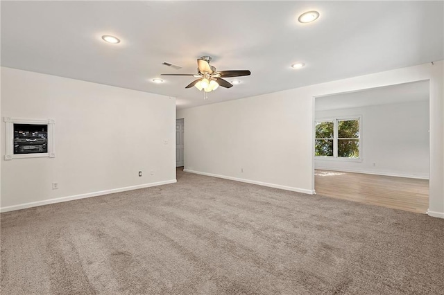 4440 Green Summers Dr, Cumming, GA 30028 - carpeted spare room featuring baseboards, ceiling fan, and recessed lighting