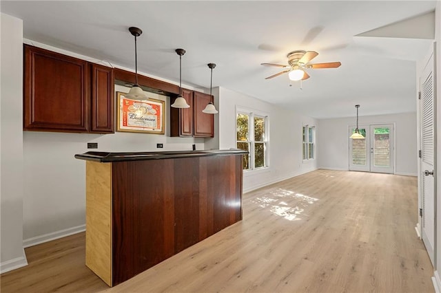 4440 Green Summers Dr, Cumming, GA 30028 - kitchen with baseboards, ceiling fan, healthy amount of natural light, and light wood-style flooring