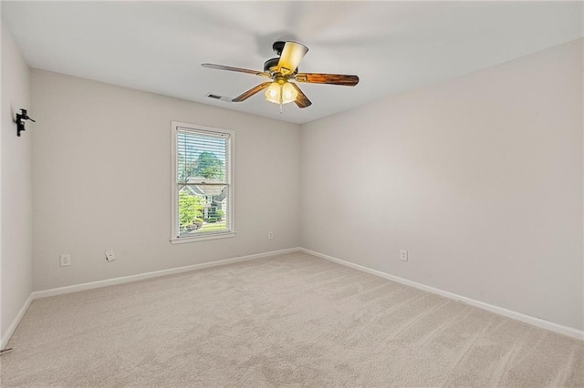 4440 Green Summers Dr, Cumming, GA 30028 - spare room with baseboards, light carpet, and ceiling fan