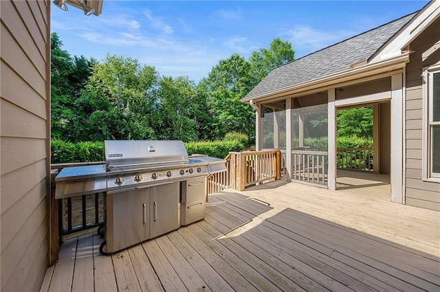 4440 Green Summers Dr, Cumming, GA 30028 - wooden terrace with a sunroom, a grill, and view of wooded area