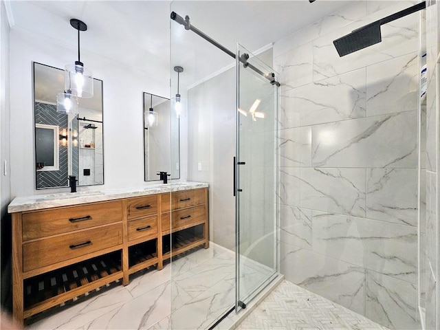 full bath featuring a marble finish shower, a sink, marble finish floor, and double vanity