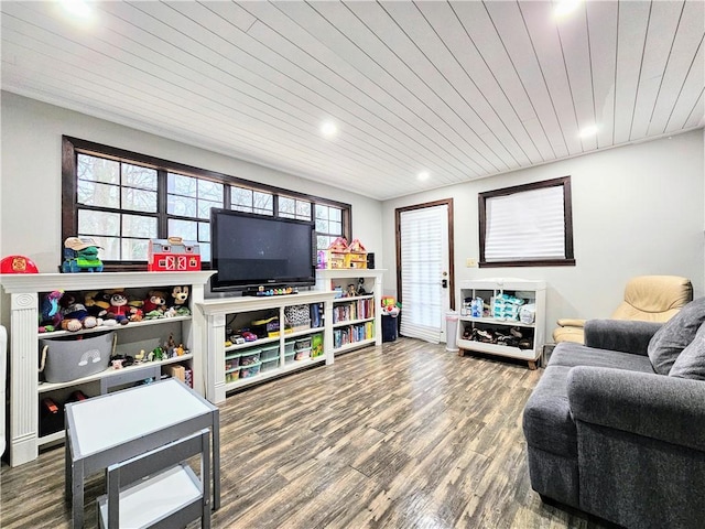 living area featuring wooden ceiling and wood finished floors