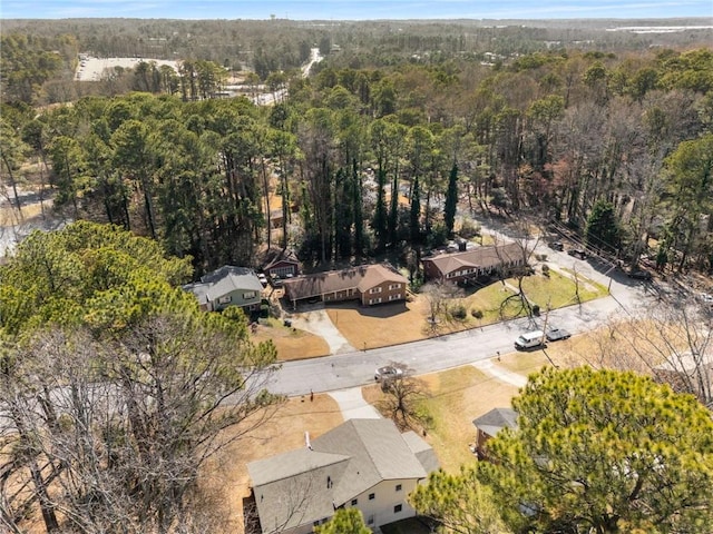 aerial view featuring a forest view