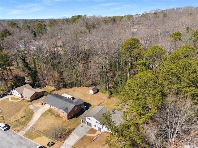 drone / aerial view with a view of trees