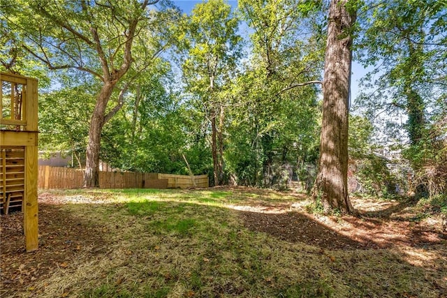 view of yard with fence