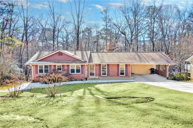 ranch-style home featuring a front yard and a carport