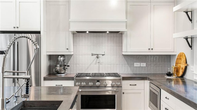 kitchen with white cabinetry and stainless steel appliances