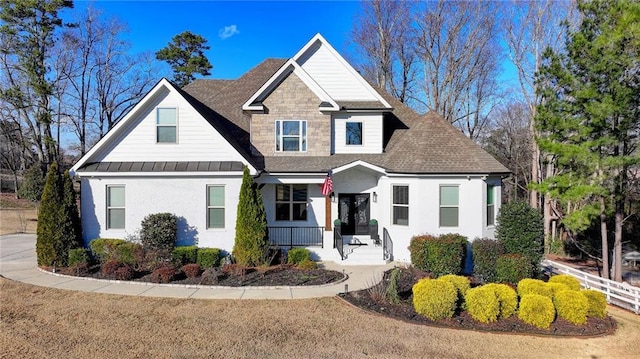 view of front of home featuring covered porch