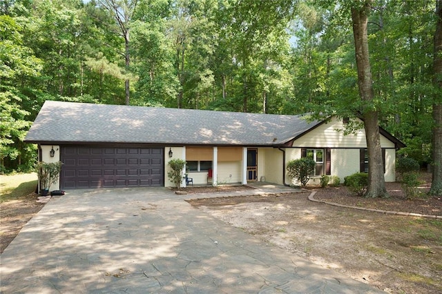 225 Hardwood Dr, Covington, GA 30016 - ranch-style house with a garage and driveway