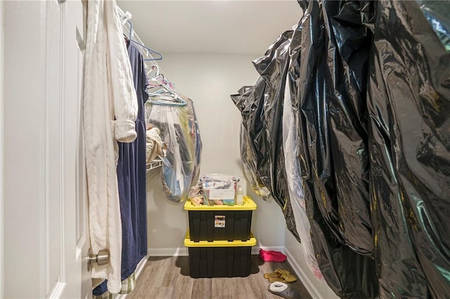 225 Hardwood Dr, Covington, GA 30016 - spacious closet featuring wood finished floors