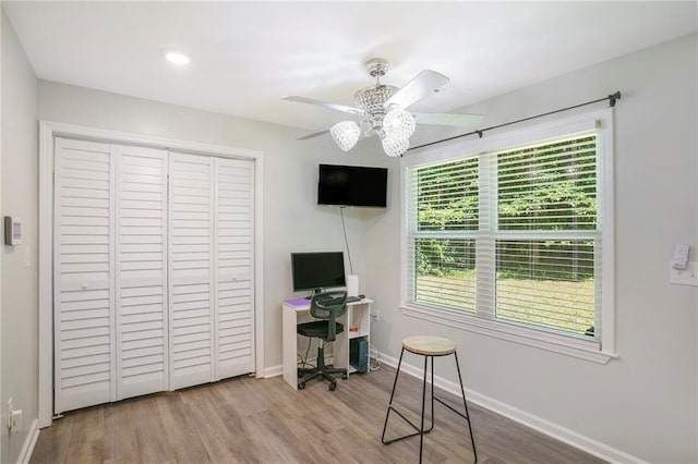 225 Hardwood Dr, Covington, GA 30016 - office with a ceiling fan, wood finished floors, and baseboards