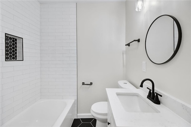 full bathroom with vanity, tile patterned flooring, tiled shower / bath combo, and toilet