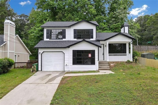 view of front facade featuring a front lawn and a garage