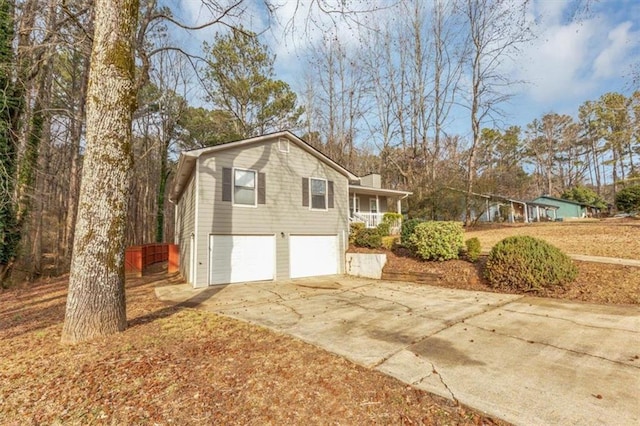 view of property exterior with a garage