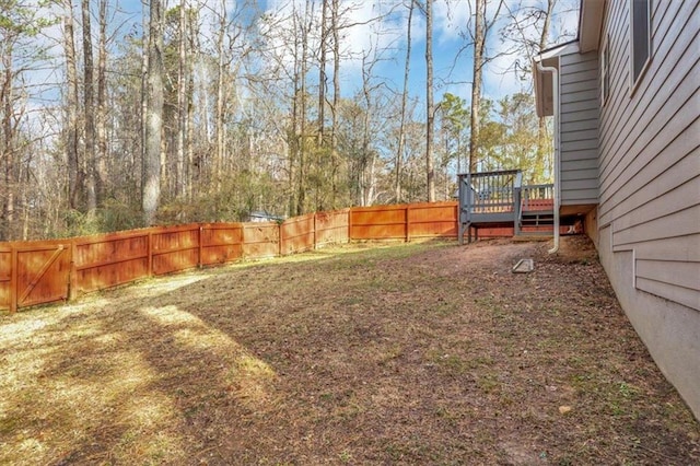 view of yard with a deck