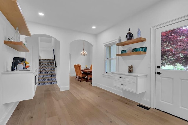 hall featuring light hardwood / wood-style flooring