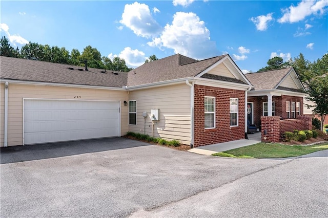 view of front of home with a garage