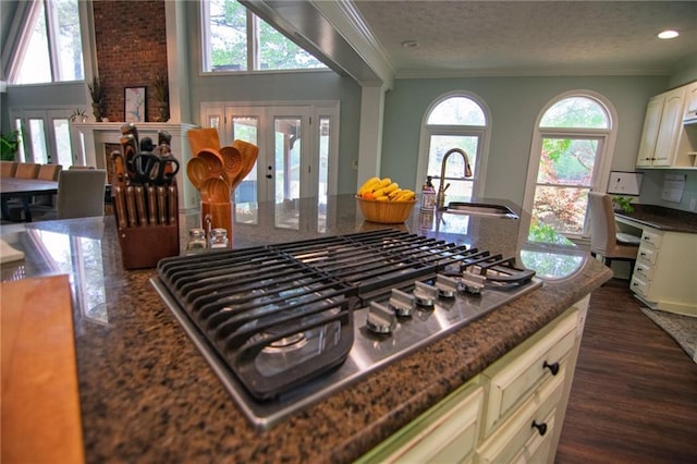 1345 Quail Hollow Dr, Hamilton, GA 31811 - kitchen featuring stainless steel gas stovetop, french doors, ornamental molding, and a sink