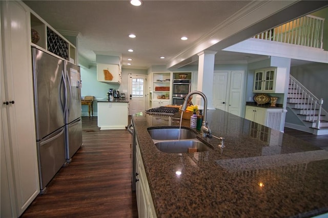 1345 Quail Hollow Dr, Hamilton, GA 31811 - kitchen with freestanding refrigerator, a sink, open shelves, crown molding, and dark wood-type flooring