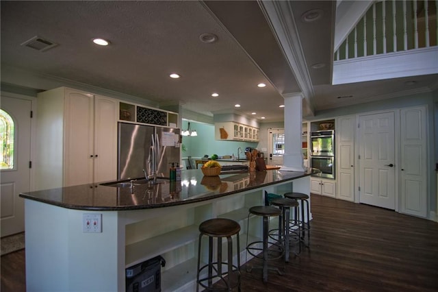 1345 Quail Hollow Dr, Hamilton, GA 31811 - kitchen with stainless steel appliances, open shelves, visible vents, recessed lighting, and dark wood-style floors
