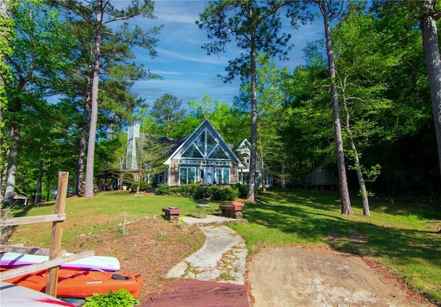 1345 Quail Hollow Dr, Hamilton, GA 31811 - view of front of home with a front lawn
