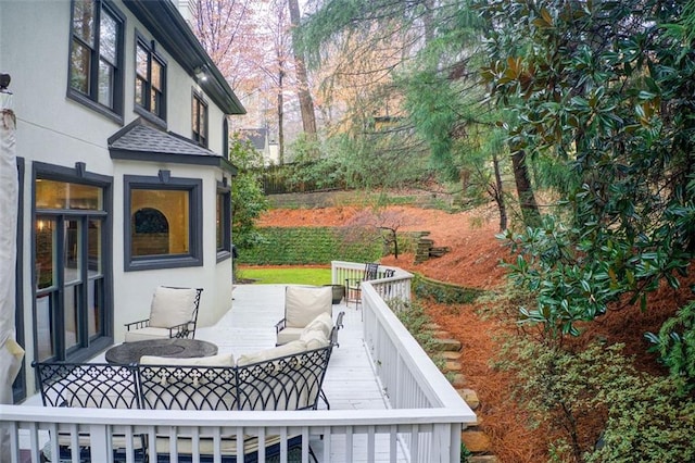 wooden deck with outdoor lounge area