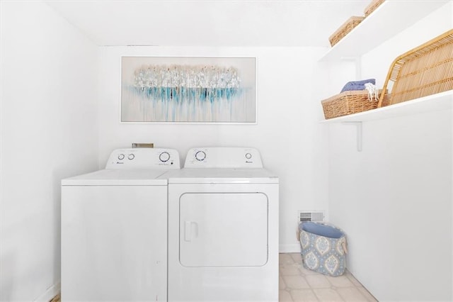 laundry area with laundry area and washing machine and dryer