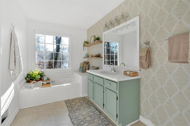 full bath featuring tile patterned flooring, a bath, and vanity