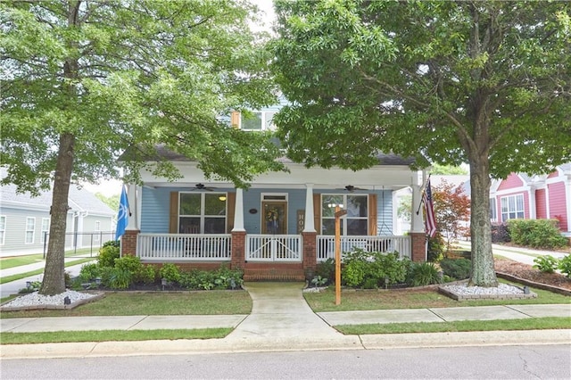 230 Ryan Ln, Covington, GA 30014 - view of front facade with covered porch, ceiling fan, and brick siding