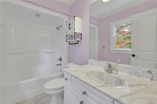 full bathroom with washtub / shower combination, toilet, vanity, crown molding, and tile patterned flooring