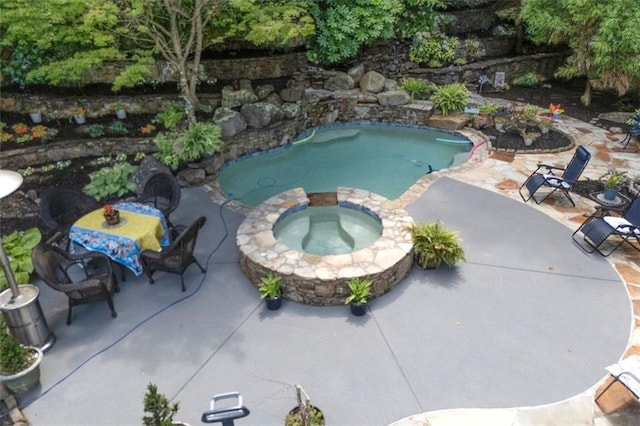 51 Mountain Ridge Dr SE, Cartersville, GA 30120 - view of swimming pool featuring a patio area and a pool with connected hot tub
