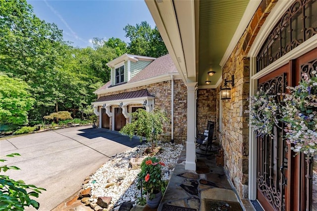 51 Mountain Ridge Dr SE, Cartersville, GA 30120 - view of side of property with stone siding, driveway, and an attached garage